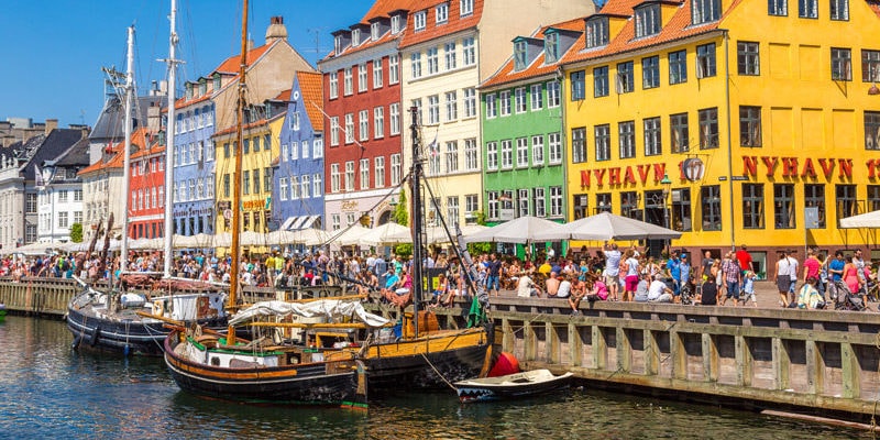 Nyhavn district is one of the most famous landmarks in Copenhagen, Denmark.