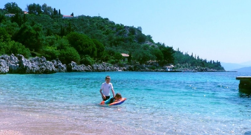 family fun at nisaki beach in north east corfu