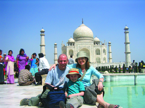 Family on holiday visiting the Taj Mahal