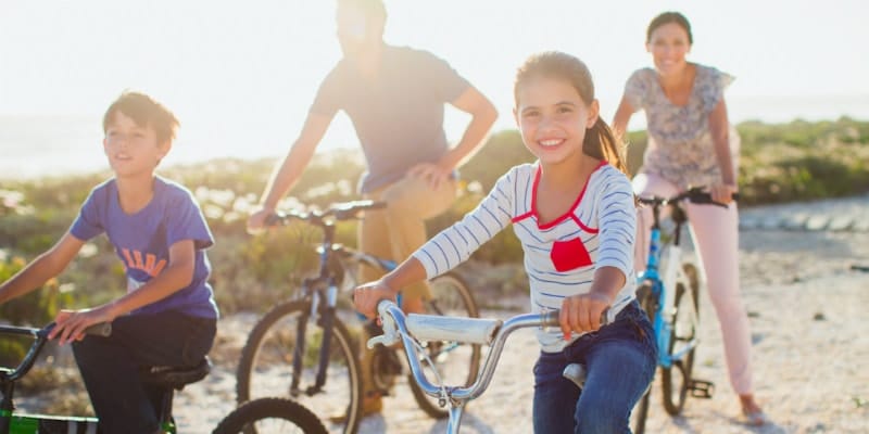 family riding bikes