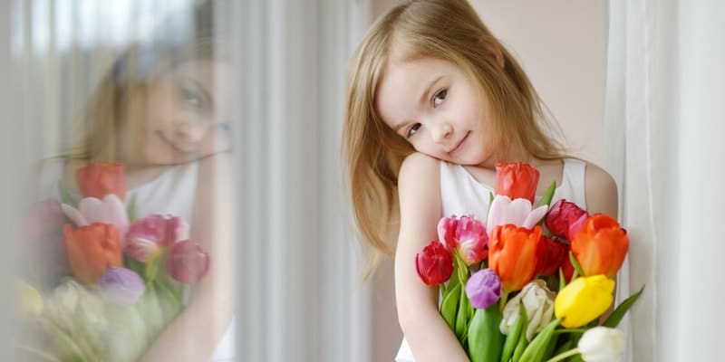 little-girl-with-tulips-mothers-day