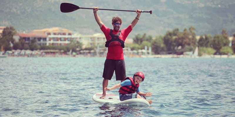 dad-and-son-paddleboarding