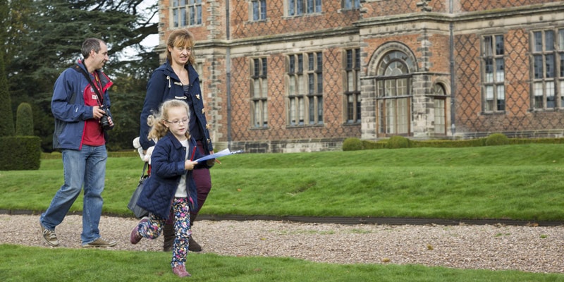 family-in-the-grounds-of-sudbury-hall-uk