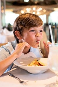 little-boy-slurping-spaghetti-at-tui-discovery-cruise-restaurant