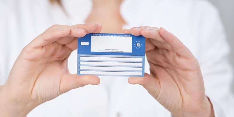 european-health-insurance-card-help-by-woman