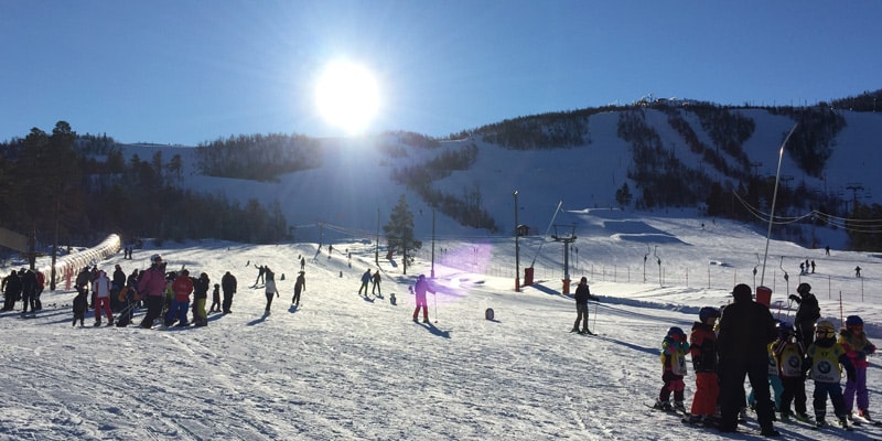 skiiers on mountain geilo norway