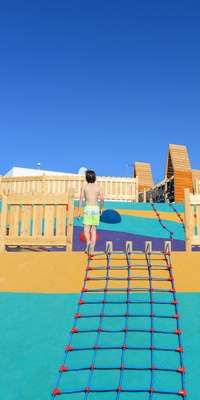 little-boy-on-climbing-frame-outside-at-hard-rock-hotel-tenerife