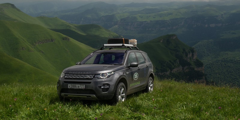 landrover-discovery-sport-suv-on-mountains