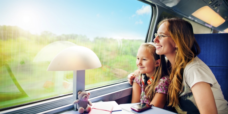 mother and daughter on train france