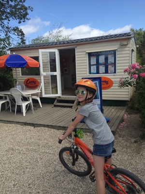 A girl on a BMX bike at Canvas holidays in Loire