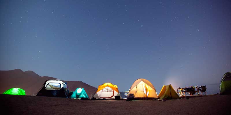 beach camping at night