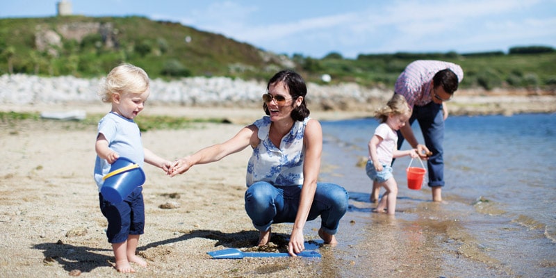 family-on-beach-isles-of-scilly