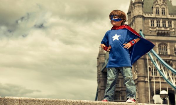boy-super-hero-costume-tower-bridge-london-family-traveller-2022