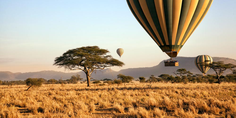 Hot air ballooning over grasslands