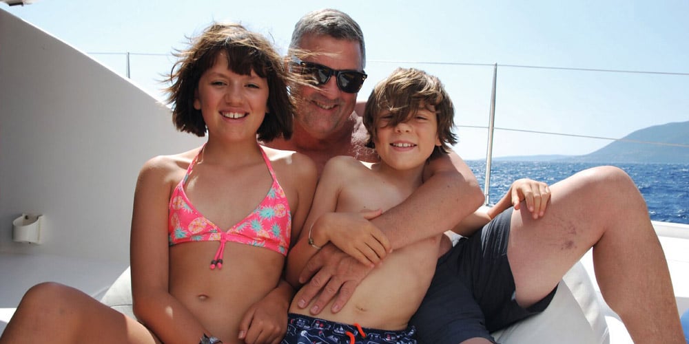 Steve with children on boat - Ionian Islands