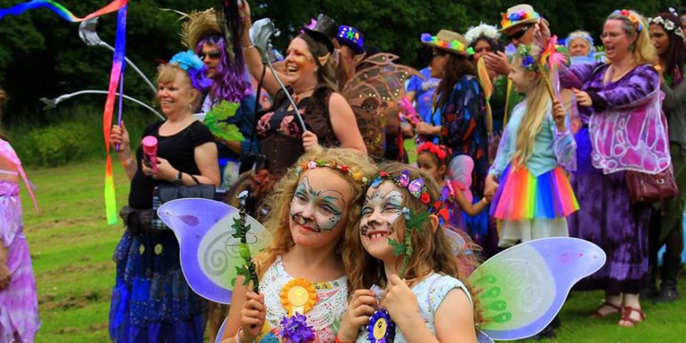 girls in costume - family-friendly festivals in 2018