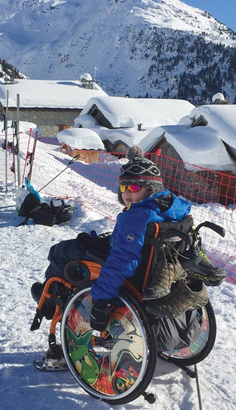 Wheelchair user on family ski holiday, La Rosière, French Alps