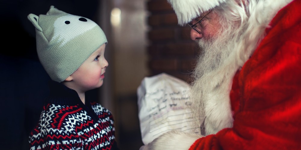 little boy and santa at UK Christmas markets