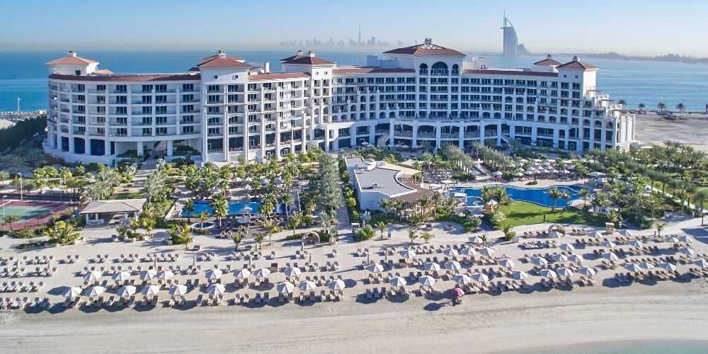 Dubai family holidays Waldorf Astoria Dubai Palm Jumeira view of Waldorf Astoria and Dubai Skyline