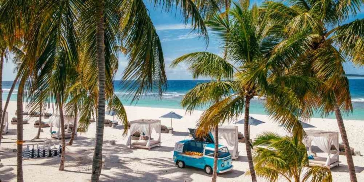 Family holiday destinations 2022 blue food truck Paradise beach the Maldives