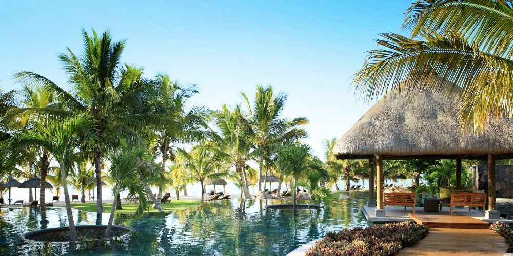 Mauritius family holidays LUX Le Morne Resort pool with Indian Ocean views