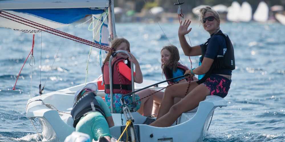 family sailing holidays at Nikiana Beach Club on Lefkada kids with sailing instructor Lefkada Greece