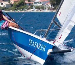 girl-sailing-hobie-cat-family-sailing-holidays-summer-2022-lefkada-greece
