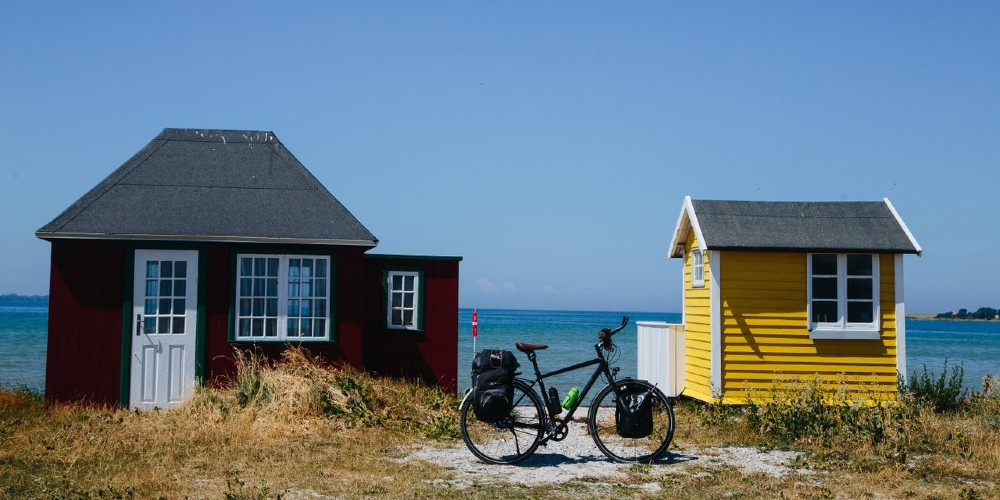 colourful-island-beach-houses-and-bicycle-on-Aero-island-denmark-family-holidays