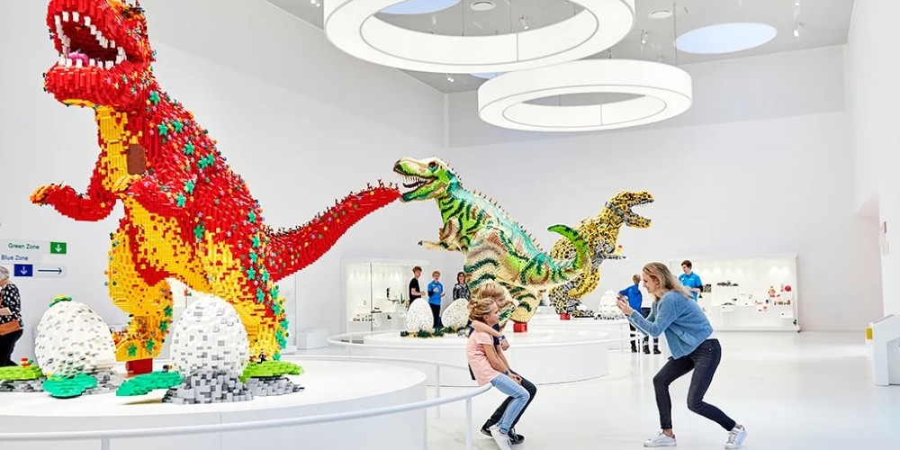 family-taking-selfies-with-lego-dinosaurs-lego-house-legoland-billund-denmark