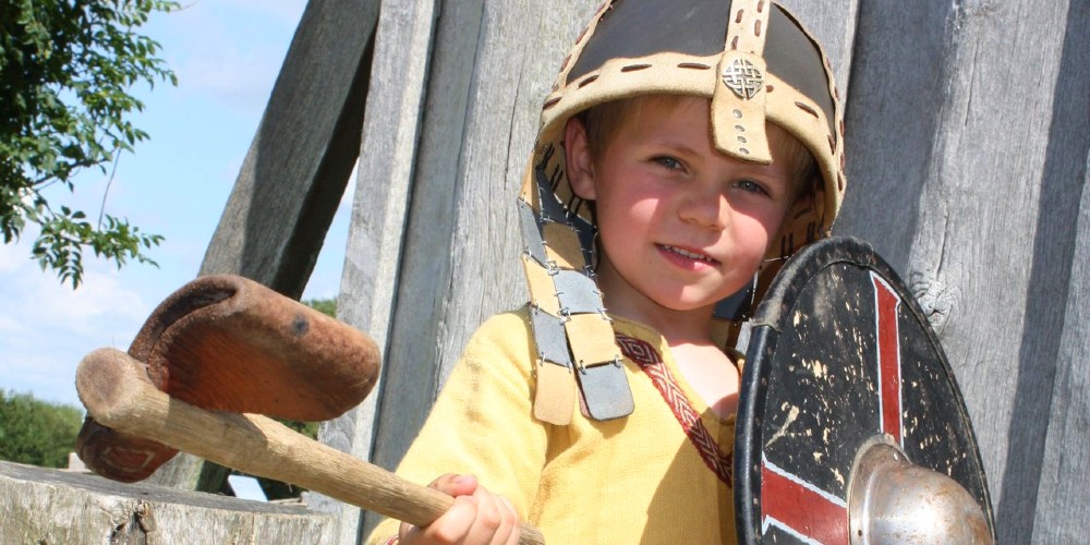 little-boy-dressed-up-as-viking-denmark-family-holidays-ribe-vikingcenter