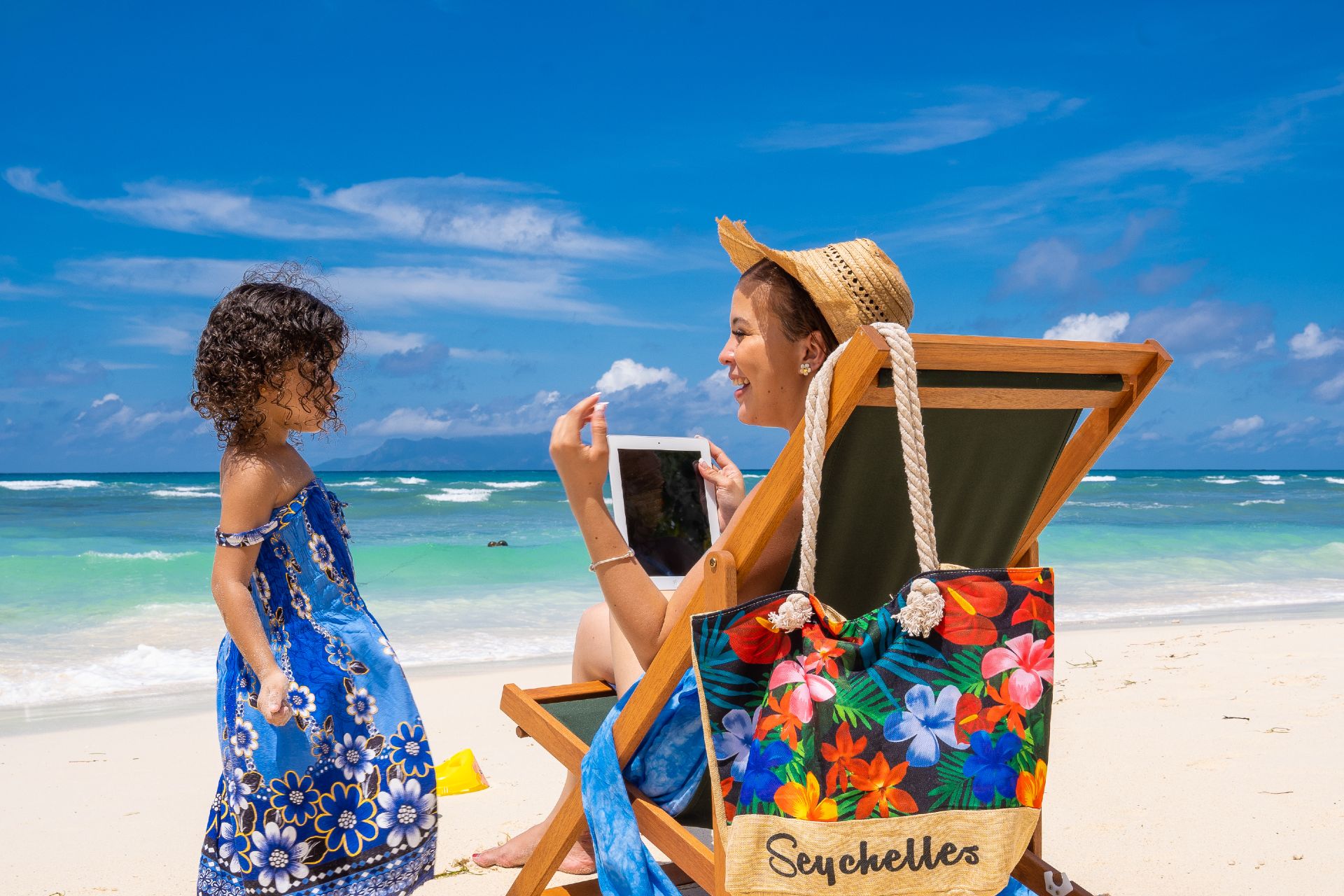 woman-and-child-on-beach-seychelles-multi-gen-holiday-destination