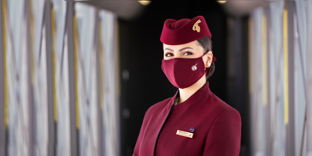 doha-stopover-deals-cabin-crew-in-mask-onboard-aircraft-2022