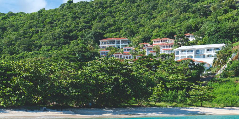 mount-cinnamon-caribbean-family-trip-competition-view-of-resort-in-hills-above-grand-anse-beach-grenada