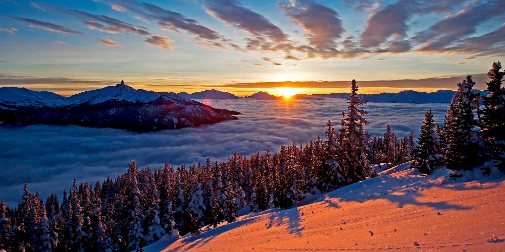 whistler-bucket-list-helicopter-sightseeing-sunrise-over-coast-mountains-british-columbia-canada