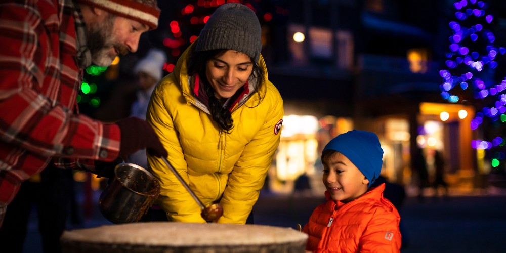 whistler-village-canada-little-boy-mother-watching-crepe-making-winter-season