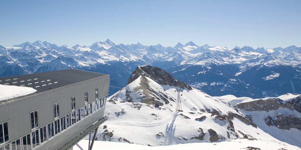 crans-montana-plaine-morte-view-from-ski-lift-over-swiss-mountains-DenisEmery