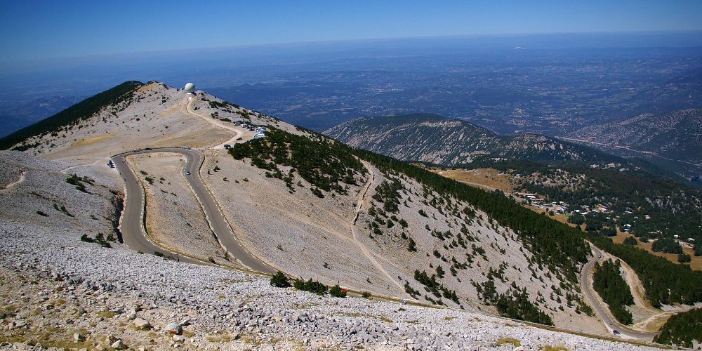 drone-image-of-cyclists-climbing-snaking-road-to-summit-of-mont-ventoux-vaucluse-france