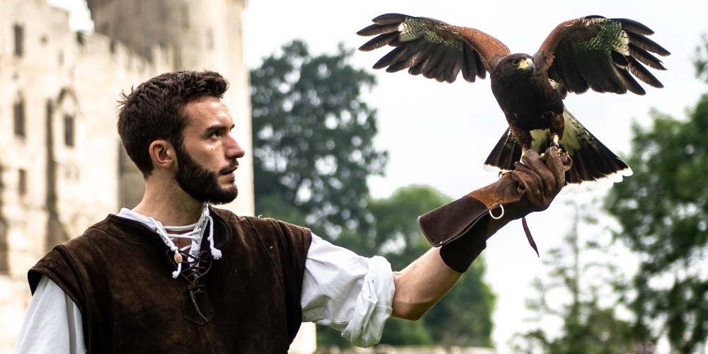 falconer-with-bird-of-prey-falcon-quest-warwick-castle-half-term-days-out-february-2022