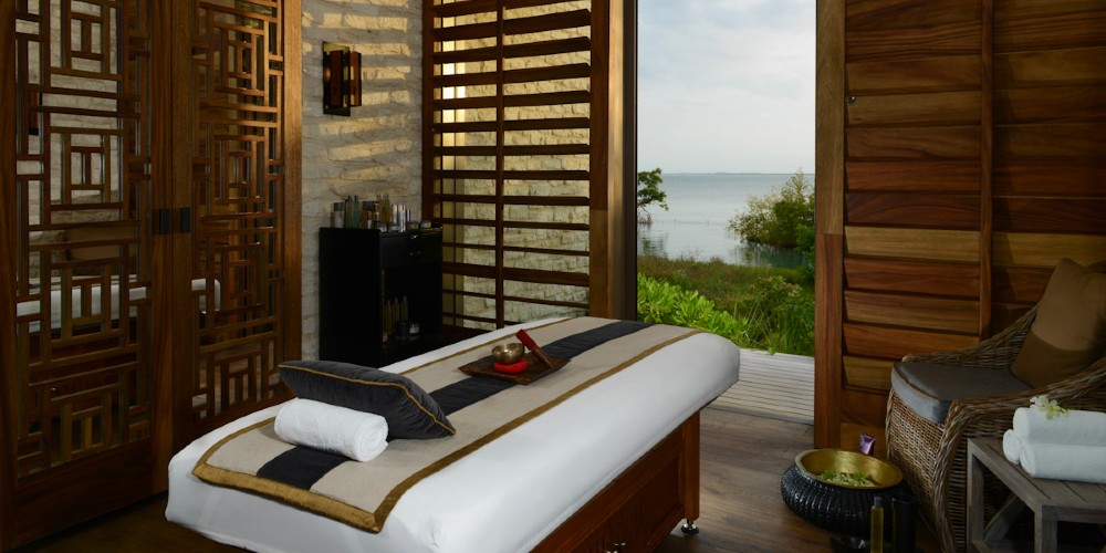 nizuc-resort-cancun-espa-spa-treatment-room-with-open-doors-overlooking-the-caribbean-sea-2022