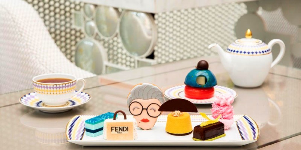 pret-a-portea-afternoon-tea-at-the-berkeley-london-fendi-and-iris-apfel-cakes-on-table-2022