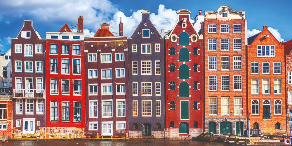 colourful-canal-houses-amsterdam-long-weekend-with-kids-guide-family-traveller-2022