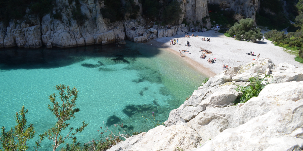 plage-den-vau-beach-with-sunbathers-best-beaches-in-france-family-traveller-2022