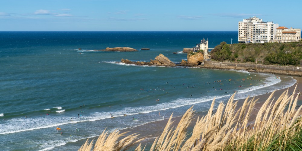 surfers-in-atlantic-biarritz-beach-basque-coast-france-2022