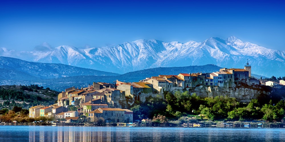 village-bages-languedoc-south-of-france-view-of-old-town-with-snowy-mountain-backdrop-2022
