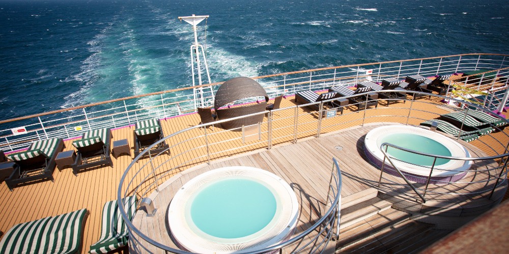 ambassador-cruise-line-nordic-treasures-cruise-scandinavia-hot-tubs-pool-deck-sun-loungers-summer-2022