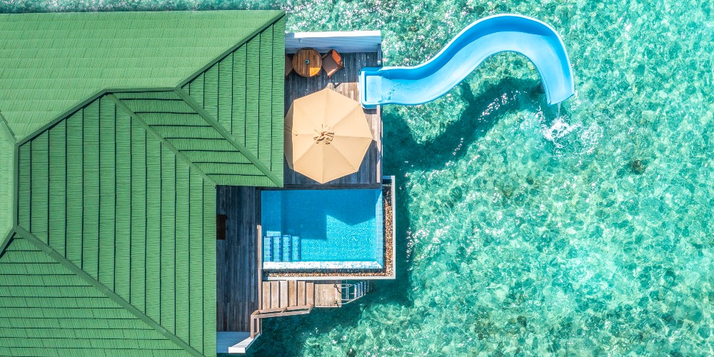 siyam-world-drone-view-overwater-villa-with-slide-sun-siyam-indian-ocean-resorts