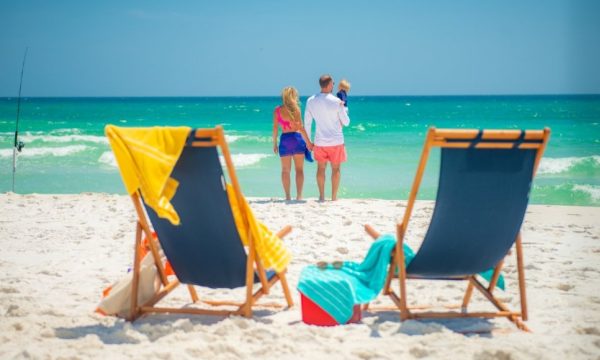 visit-pensacola-family-beach-deck-chairs-white-sand-gulf-of-mexico-2022