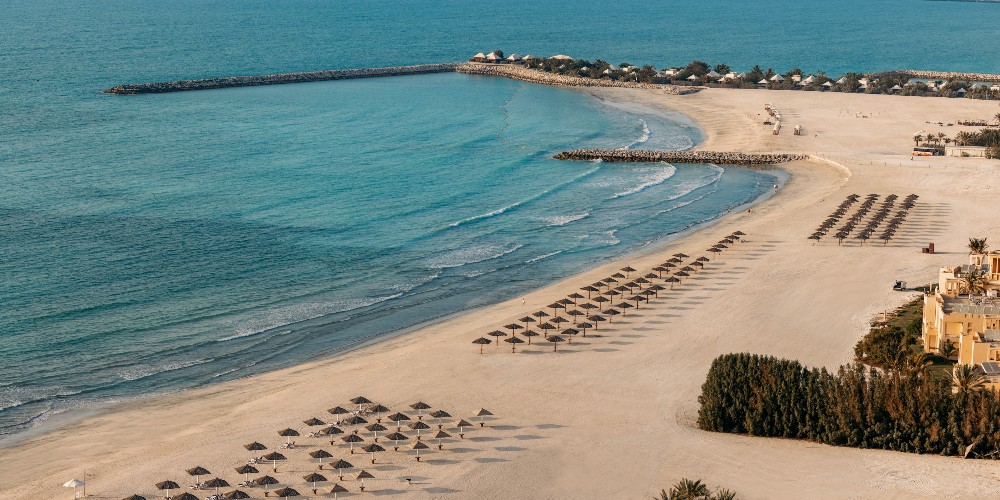 beach-arabian-gulf-sun-umbrellas-resort-hotel-ras-al-khaimah-uae-kenwood-travel