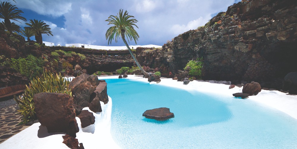 blue-pool-black-volcanic-rock-jameos-del-agua-lanzarote-canary-islands-spain