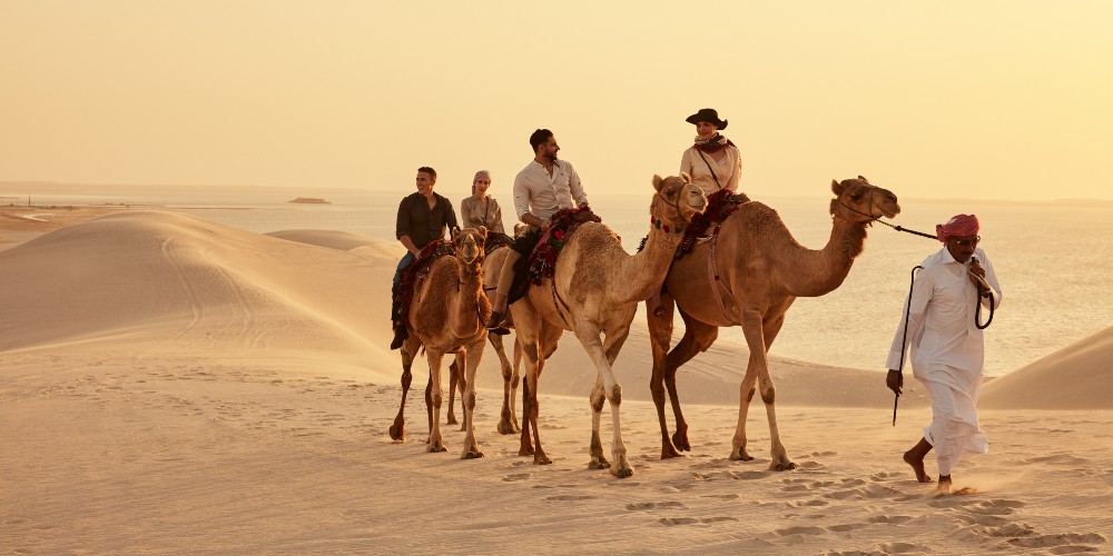 camel-train-tourist-desert-safari-doha